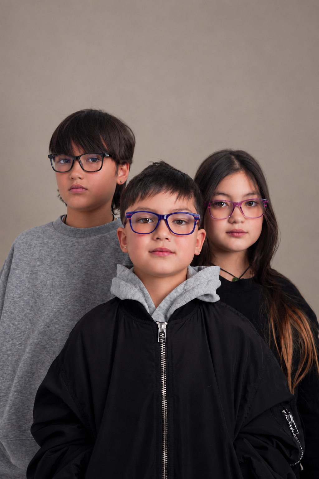 Three children wearing Square Eyes UV400 and blue-light glasses